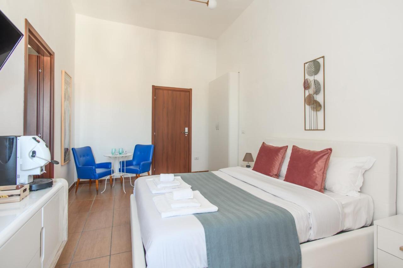 Naro Suites And Rooms Баколи Экстерьер фото