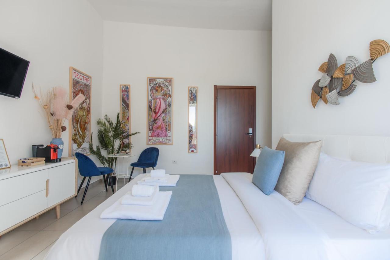 Naro Suites And Rooms Баколи Экстерьер фото