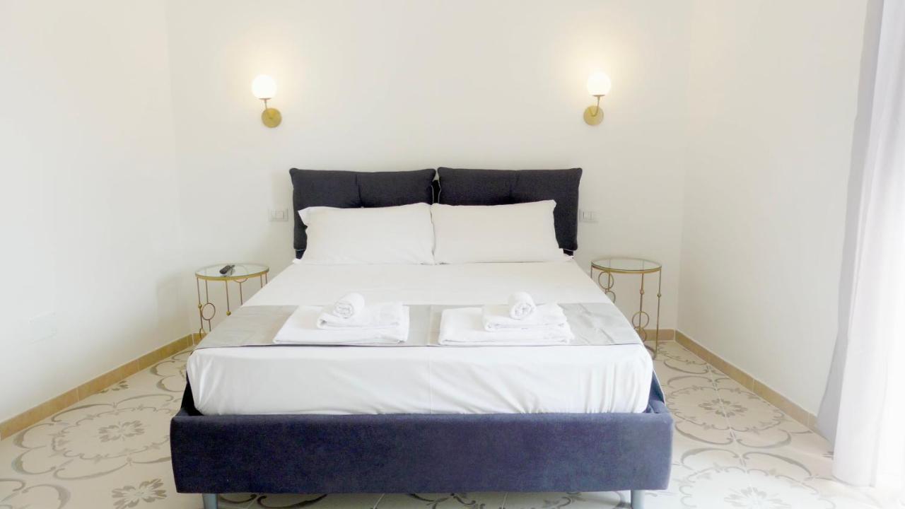 Naro Suites And Rooms Баколи Экстерьер фото
