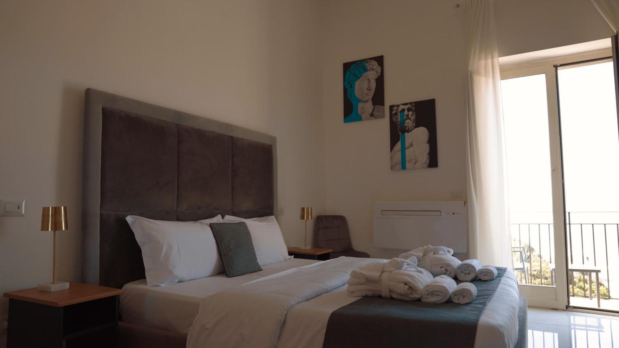 Naro Suites And Rooms Баколи Экстерьер фото